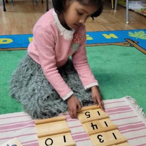 Child Solving Math Problem | Bermuda Montessori